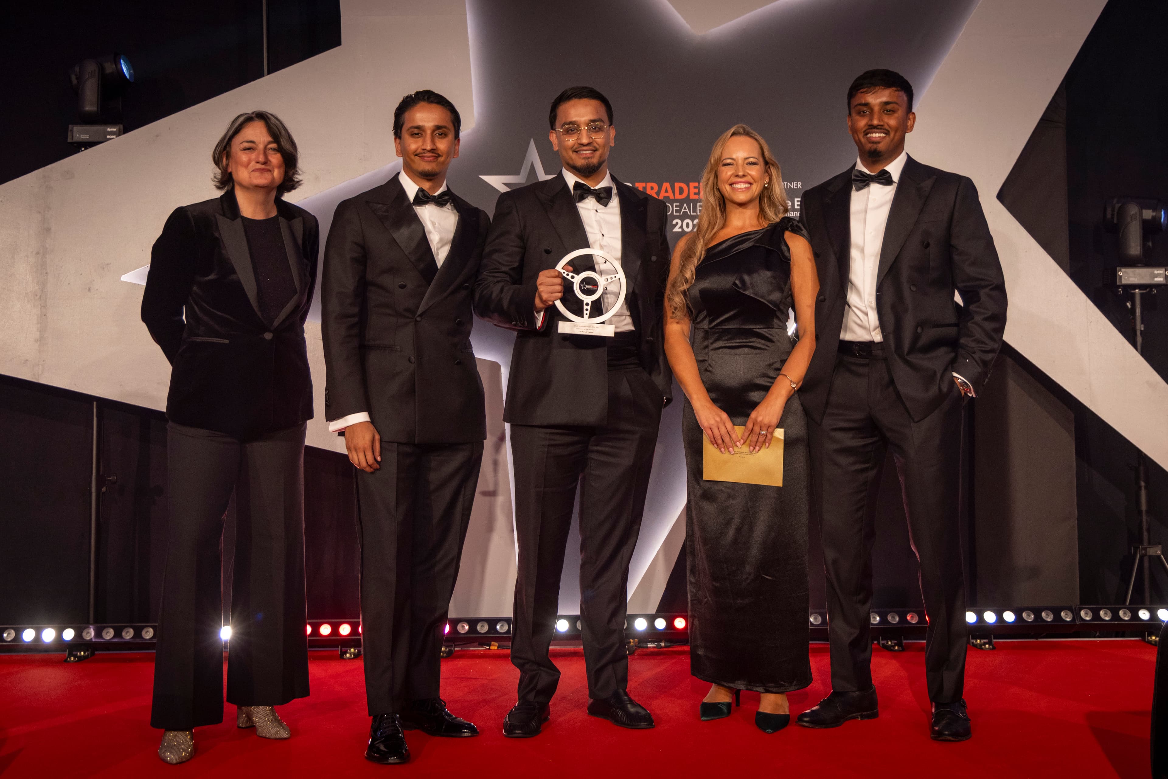 Car Planet team receiving an industry award